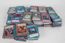 Extensive collection of Yu-Gi-Oh! cards, including assorted first editions, some in protective