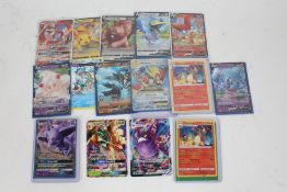 Collection of Pokemon TCG cards, to include two Charizard 025/185, Pidgeot EX 65/108, Espeon GX Holo