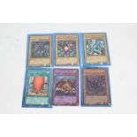 Yu-Gi-Oh! cards, to include a Blue-Eyes White Dragon 1st Edition SKE-001, a Thousand Dragon 1st