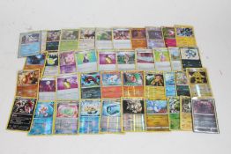 Collection of Pokemon TCG Holo cards, to include Frosmoth 064/202, Alolan Meowth 78/149, Darkrai