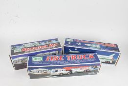 Three boxed Hess models, consisting of Recreation Van with Dune Buggy and Motorcycle, Fire Truck,