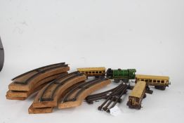 Model railway tinplate engine and rolling stock, marked "made in Great Britain", quantity of