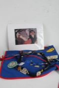 Walt Disney collectables and ephemera, to include mickey mouse apron, two lanyards with pins and