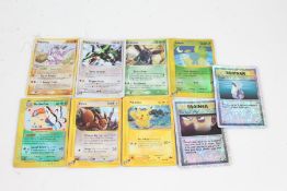 Collection of Pokemon cards, to include Holo Rayquaza EX 97/97 Eevee 75/147, Pikachu 84/144, Holo