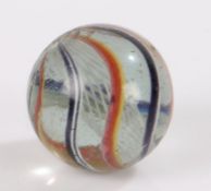 Large 19th Century Latticinio core swirl glass marble, with two multi-coloured bands in white,