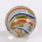 Large 19th Century Latticinio glass marble, in blue, white yellow, green and red, 37mm diameter