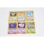 Pokemon TCG, to include a Holo Zapdos 16/102, Mewto 3, Holo Machamp 8/102, Haunter 21/62,