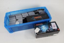 Extensive collection of Magic: The Gathering cards, including a Deck Builder's Toolkit box,