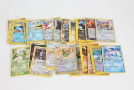 Collection of Pokemon cards, to include Larvitar 89/147, Holo Latias 4/10, Holo Latios 2/10, Dark