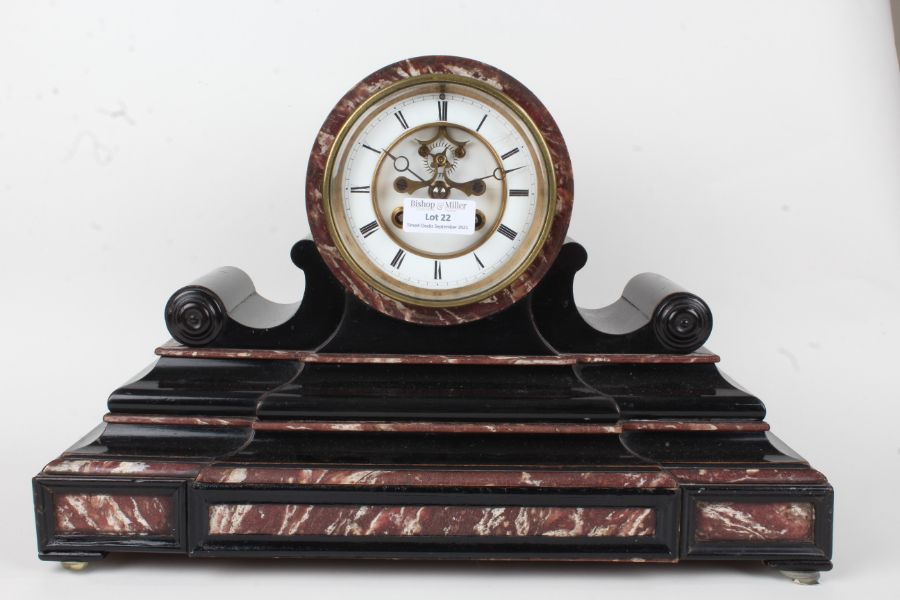 Ebonised marble effect mantel clock, the enamel dial with Roman numerals and visible escapement, the
