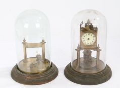 Two part complete anniversary clocks, housed under glass domes (2)