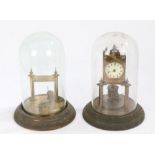 Two part complete anniversary clocks, housed under glass domes (2)