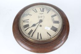 Two oak cased wall clocks, the cream painted dials with Roman numerals and subsidiary seconds dials,