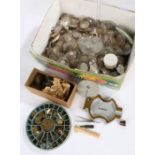 Quantity of wrist and pocket watch glasses, various sizes, circular tray containing watch parts,