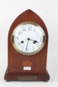 Edwardian mahogany and inlaid mantel clock, of lancet form, the enamel dial with arabic numerals,