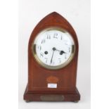 Edwardian mahogany and inlaid mantel clock, of lancet form, the enamel dial with arabic numerals,