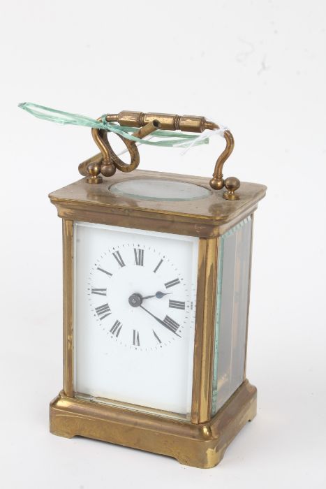 French brass cased carriage clock, the enamel dial with Roman numerals, 14cm high