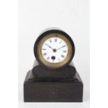 Edwardian slate mantel clock, the white enamel dial with Roman numerals, the case with carved