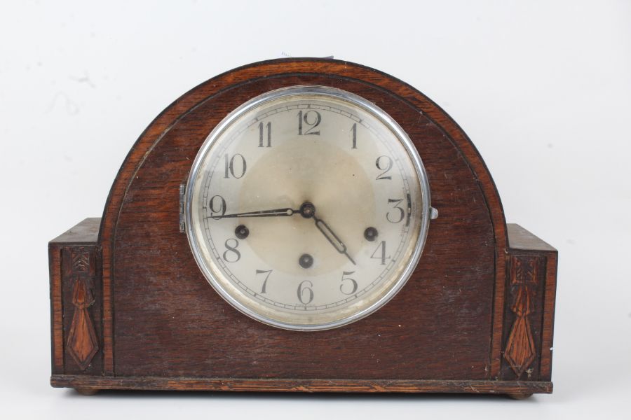 1930's oak cased mantel clock, with silvered dial and arabic numerals, 33cm wide