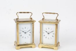 Two Bayard brass cased carriage clocks, one with visible escapement, the white dials with Roman