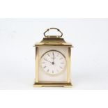 Brass carriage clock by Rapport, the white dial with Roman numerals, 14.5cm high