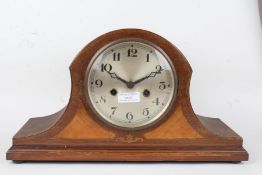 Edwardian Napoleon hat mantel clock, the silvered dial with Arabic numerals, the case with marquetry