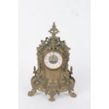 20th Century cast brass mantel clock, in the French style, the white dial with black Roman numerals,