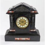 Edwardian slate and marble mantel clock, with metal mask and scroll decorated pediment and