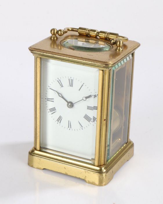 20th Century brass cased carriage clock, having visible platform escapement, white enamel dial