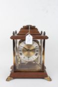 Schatz bracket clock, with a four panel case and swing handle, 31.5cm high