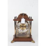 Schatz bracket clock, with a four panel case and swing handle, 31.5cm high
