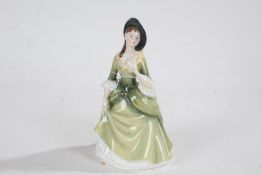 Royal Doulton figurine 'Sandra', HN2401, wearing a green dress, 22cm tall