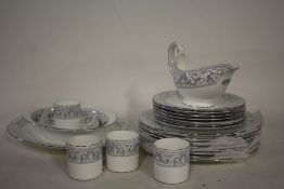 Wedgwood Dolphins porcelain dinner service, R4652, to include a gravy boat and dish, a serving dish,