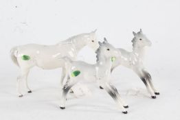 Beswick dapple grey horse, with two Beswick foals similar (3)