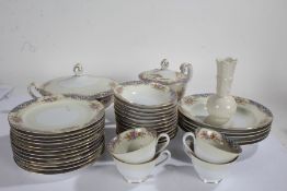 Large quantity of Noritake porcelain tea and dinner ware, all decorated with flowers on a cream