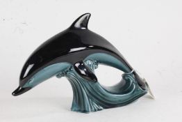 Poole pottery leaping dolphin. 27cm wide