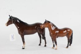 Two Beswick brown glazed horses (one leg AF) (2)