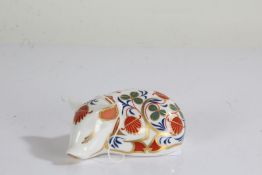 Royal Crown Derby paperweight, in the form of a recumbent pig, 8cm