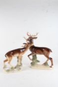 Two Ceramic Stags made by a Jema of Holland, the larger of the two is 44cm tall