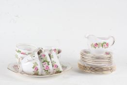 Quantity of Colclough rose tea ware, comprising six each cups, saucers, and side plates, cream