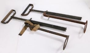 Two Second World War stirrup hand pumps as used Fire Guards to put out incendiary bombs