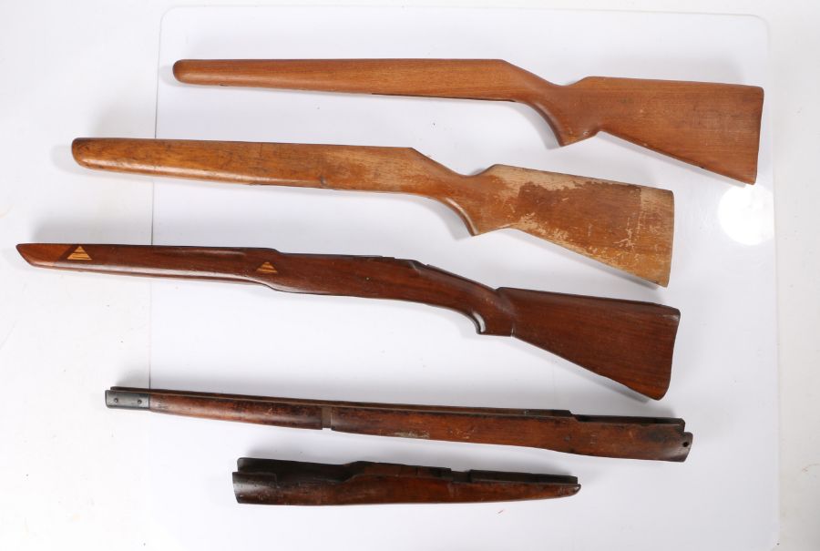 Selection of wooden rifle stocks, (5)