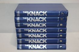 Seven volumes of the Knack, housed in official albums, together with the Reader's Digest Great World