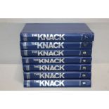 Seven volumes of the Knack, housed in official albums, together with the Reader's Digest Great World