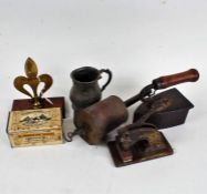 Works of art, to include a Gothic style tankard, two flat irons, pierced brass plagues, mounted