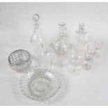 Glassware, to include cut bowls, decanters, stoppers, various glasses, and two pairs of candlesticks