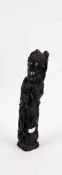 African ebonised figure of characters holding onto each other, 40cm high