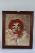 J. Gulikers?, portrait study of a clown, signed oil on canvas, housed within a mahogany frame, image