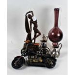 Works of art to include Art Deco style dancing figure, motorcycle and bicycle models, tall purple