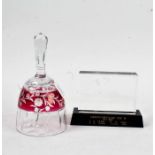 Bohemia style glass hand bell, the ruby central band with etched foliate decoration, 23cm high,